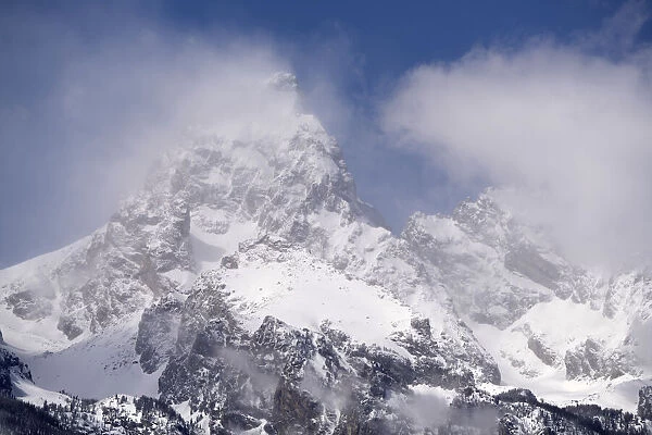 USA, Wyoming, Grand Teton National Park. Clouds over mountains during spring snowstorm