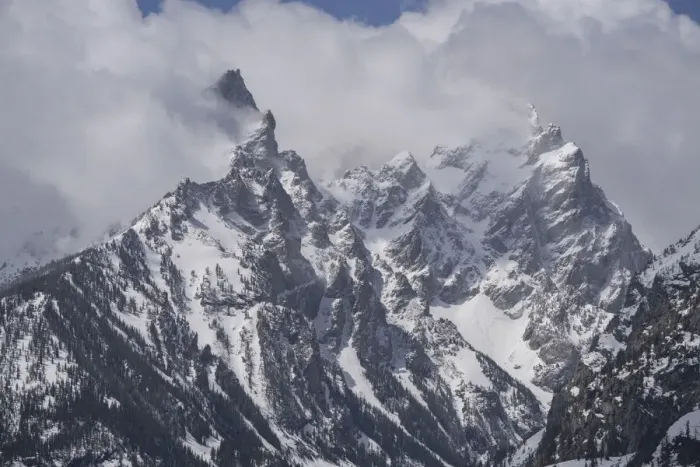 Framed Print : USA, Wyoming, Grand Teton National Park. Clouds over mountains during spring snowstorm