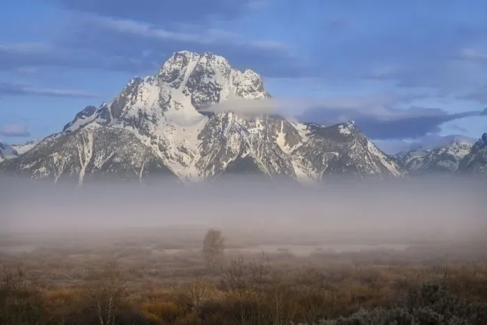 Framed Print : USA, Wyoming, Grand Teton National Park. Sunrise on cloudy Teton Range