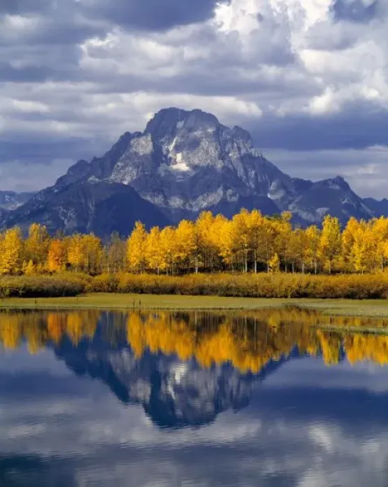 Framed Print : USA, Wyoming, Grand Teton NP. Against the blue-gray peaks of the Tetons, glowing