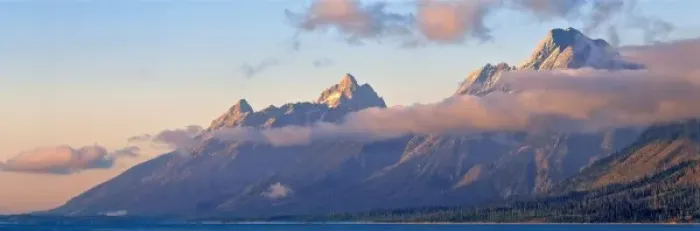 Framed Print : USA, Wyoming, Grand Teton NP. Sunrise crawls over the steep flanks of the Tetons Framed Print : USA, Wyoming, Grand Teton NP. Sunrise crawls over the steep flanks of the Tetons