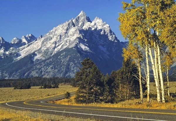 USA, Wyoming, Grand Teton NP. Teton Parkway winds below the magestic mountains of