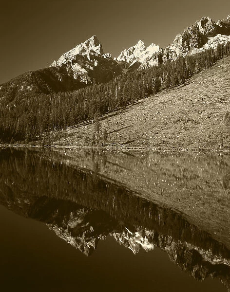 USA, Wyoming, Grande Teton National Park, Cathedral Group mountain reflecting in