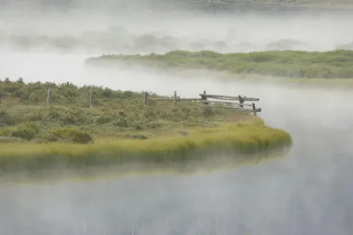 Framed Print : USA, Wyoming, Green River. Morning fog settles on grassy land and curving river. Credit as