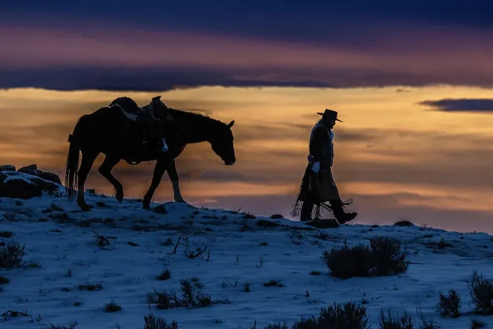 Framed Print : USA, Wyoming. Hideout Horse Ranch, wrangler and horse at sunset. (MR, PR) Framed Print : USA, Wyoming. Hideout Horse Ranch, wrangler and horse at sunset. (MR, PR)