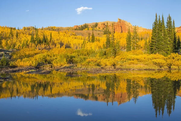 USA, Wyoming, Sublette County. The Red Cliffs in the Wyoming Range mountains is reflected