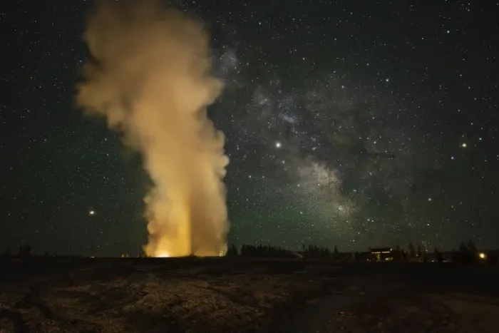 Framed Print : USA, Wyoming, Yellowstone National Park. Milky Way over an erupting Old Faithful Geyser