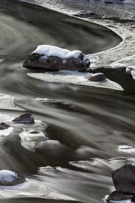 Framed Print : USA, Wyoming, Yellowstone National Park. A long time exposure creates blurred lines of water flowing around rock and ice in a partially frozen Lamar River Framed Print : USA, Wyoming, Yellowstone National Park. A long time exposure creates blurred lines of water flowing around rock and ice in a partially frozen Lamar River