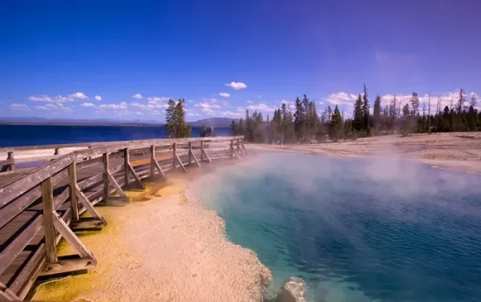 Framed Print : USA. Wyoming. Yellowstone National Park. Tourist at Black Pool in the West Thumb Geyser Basin