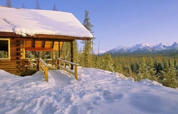 USFS Schnauss Cabin rental in Winter ovelooking peaks in Glacier National Park in winter
