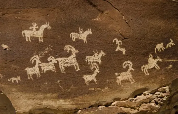 Framed Print : Ute Petroglyphs Depicting Horse and Rider with Bighorn Sheep and Dog-Like Animals