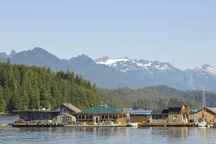 Framed Print : Vancouver Island, Tofino. Floating houses in front of mountains of Strathcona Provincial Framed Print : Vancouver Island, Tofino. Floating houses in front of mountains of Strathcona Provincial