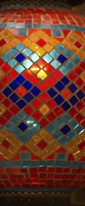 Framed Print : Vendor in Spice Market offerring colorful Stained Glass Lamps, Spice Market Istanbul