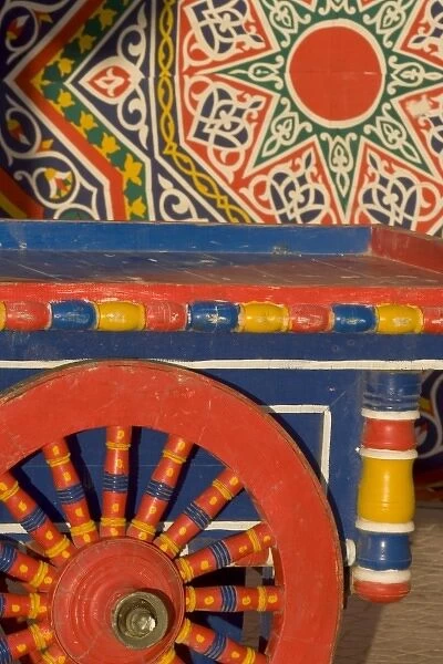 Vendors cart and wheel design of the colorful wooden spokes in Alexandria, Egypt