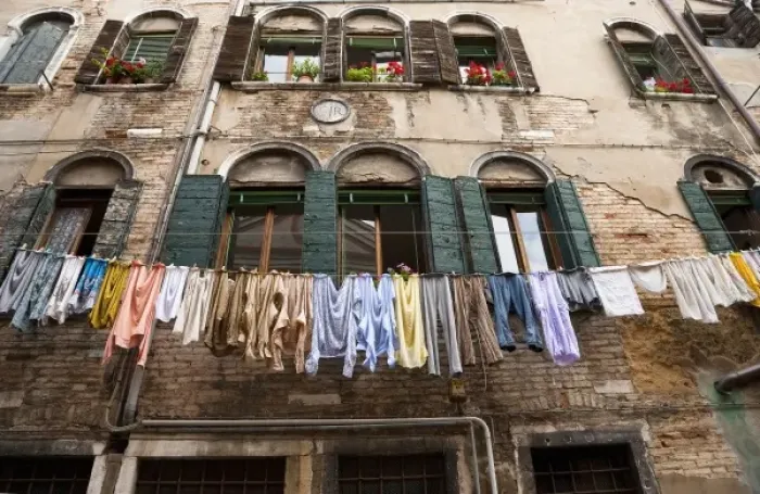 Framed Print : Venice, Veneto, Italy - Laundry is hanging on an outside clothesline to dry in an Framed Print : Venice, Veneto, Italy - Laundry is hanging on an outside clothesline to dry in an