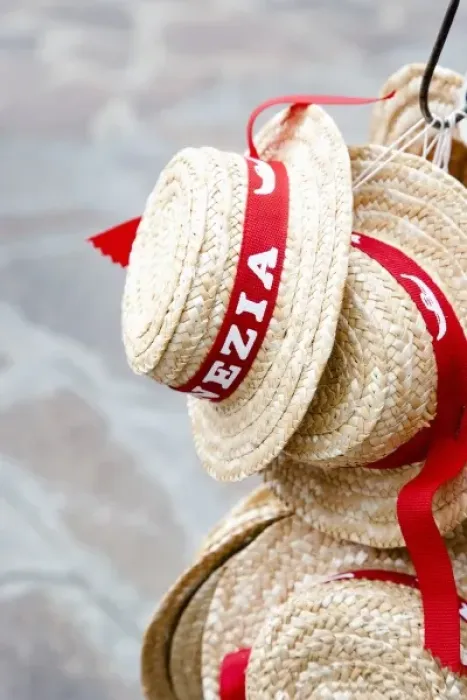 Framed Print : Venice, Veneto, Italy - Straw hats for sale to tourists are hanging from a hook