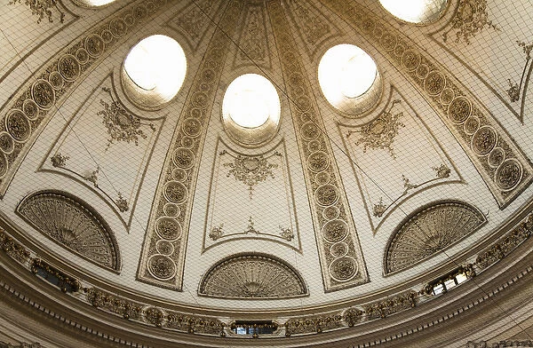 Vienna, Austria - Cropped and low angle view of an ornately designed, domed, ceiling