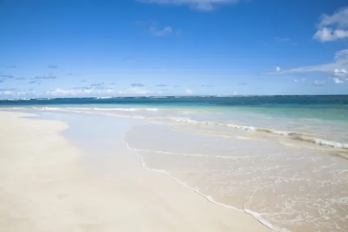 Framed Print : Vieques, Puerto Rico - Gentle waves are rolling up onto the white sands of a tropical beach