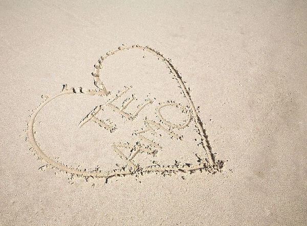 Vieques, Puerto Rico - A heart is drawn in the sand of a beach with the words te