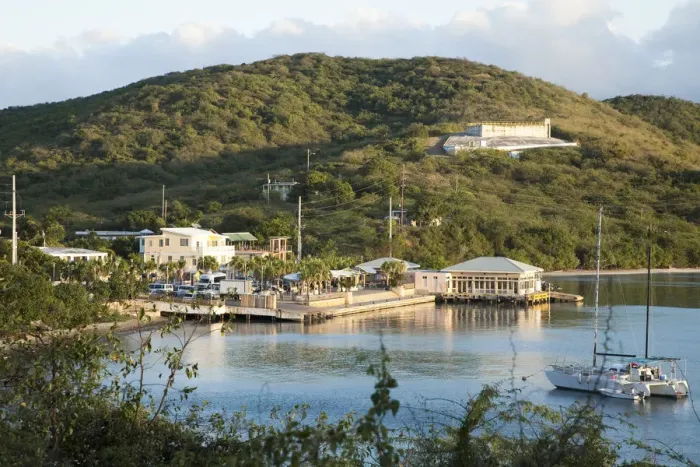 Framed Print : Vieques, Puerto Rico - A seaside marina is set in the waters of a calm ocean bay
