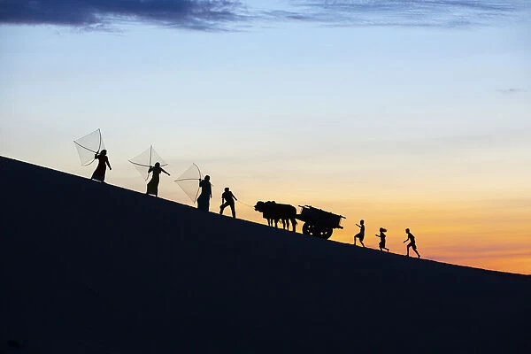 Vietnam. Nam Cuong dunes at Nha Trang, Cham People on their way to work