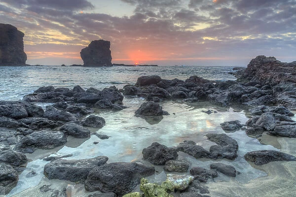 View from beach at Manele Bay of Puu Pehe (Sweetheart Rock) at sunrise, South Shore of Lanai Island