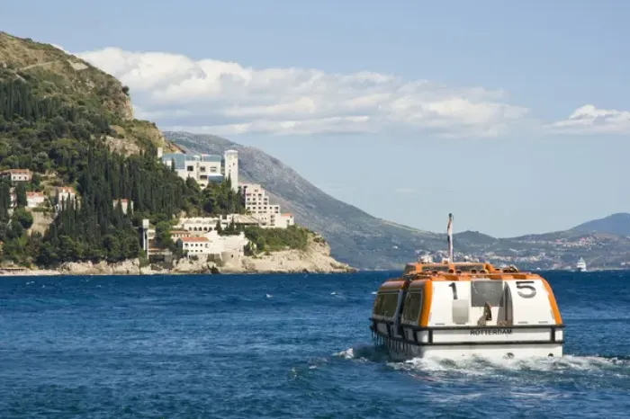 Framed Print : View of boat outside of Walled City of Dubrovnik, Southeastern Tip of Croatia, Dalmation Coast