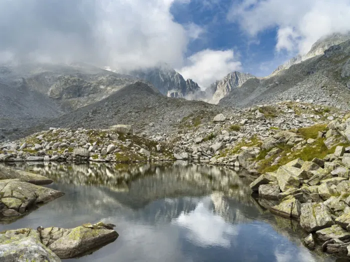 Framed Print : View towards Cima Presanella draped in clouds near Rifugio Segantini Framed Print : View towards Cima Presanella draped in clouds near Rifugio Segantini
