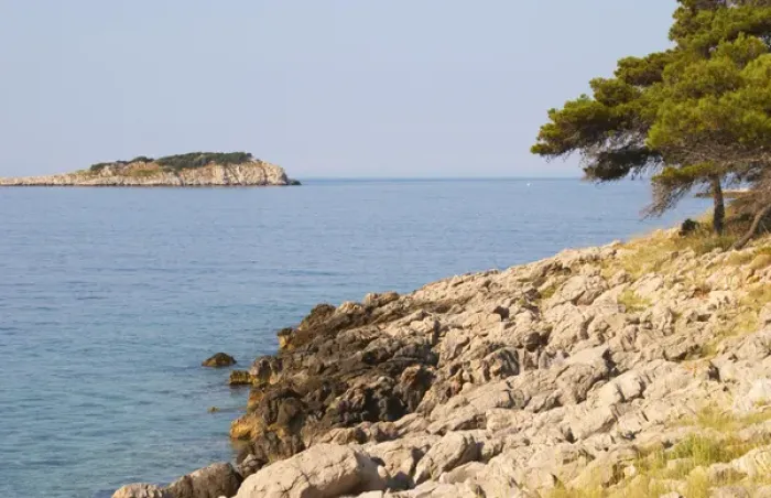 Framed Print : View over coast cliffs with pine trees over the sea water towards an island. Prizba village Framed Print : View over coast cliffs with pine trees over the sea water towards an island. Prizba village