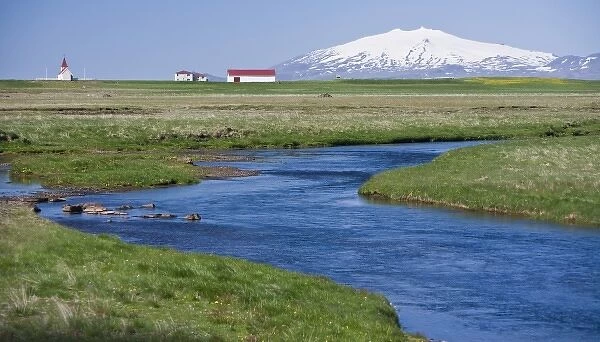View of Icelandic farm, with Snaefellsjokull volcano in the distance