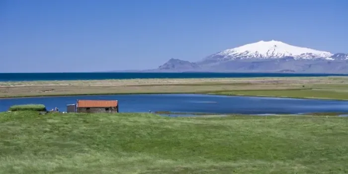 Framed Print : View of Icelandic farm, with Snaefellsjokull volcano in the distance Framed Print : View of Icelandic farm, with Snaefellsjokull volcano in the distance