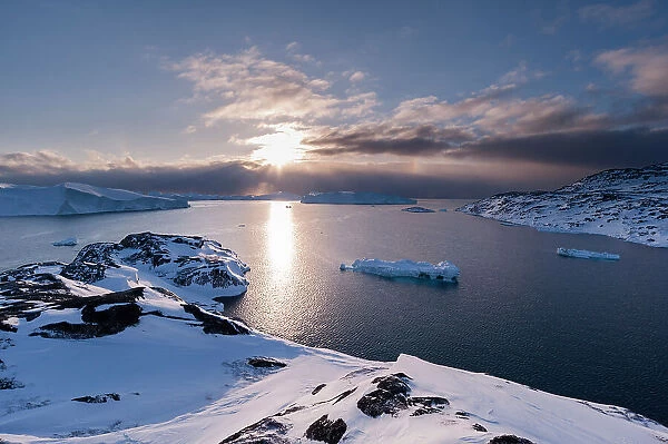 A view of Ilulissat Icefjord, a UNESCO World Heritage Site, at sunset. Ilulissat Icefjord, Ilulissat, Greenland