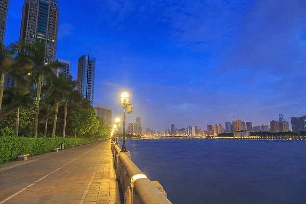 view along Pearl River of city skyline from Yacht Club, Guangzhou, China
