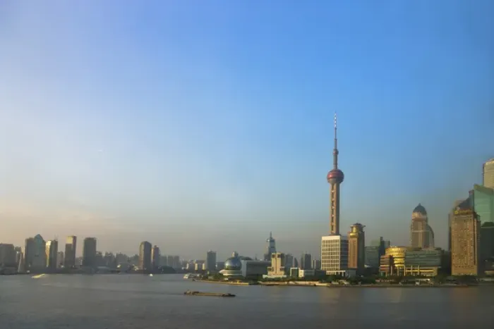 Framed Print : View of Pudong skyline dominated by Oriental Pearl TV Tower by Huangpu River, Shanghai