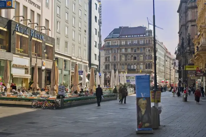Framed Print : A view down a street in Viennia Austria as I walked the tourist seen