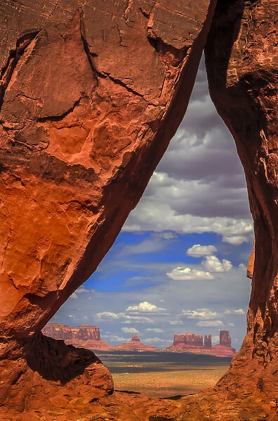View through the Teardrop Arch into Monument Valley Tribal Park of the Navajo Nation