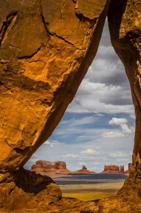 Framed Print : View through the Teardrop Arch into Monument Valley Tribal Park of the Navajo Nation Framed Print : View through the Teardrop Arch into Monument Valley Tribal Park of the Navajo Nation