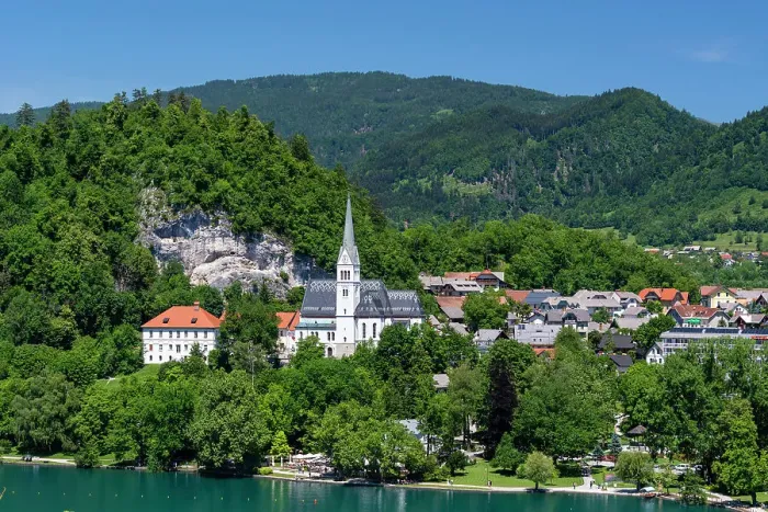 Framed Print : A view of the town of Bled and Saint Martin's church. Bled, Slovenia
