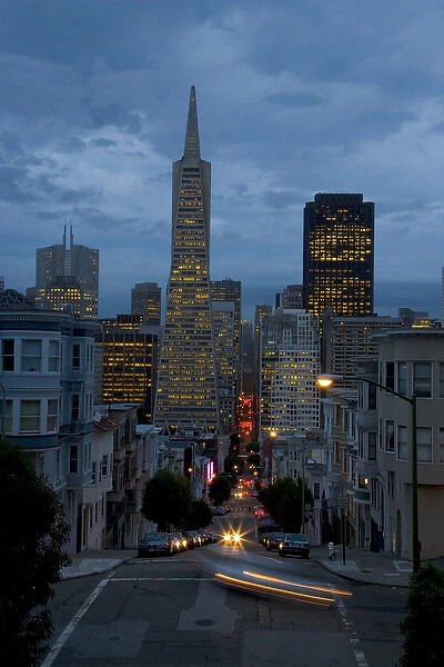 View of the TransAmerica Building from Montogomery Street just a dusk with the traffic