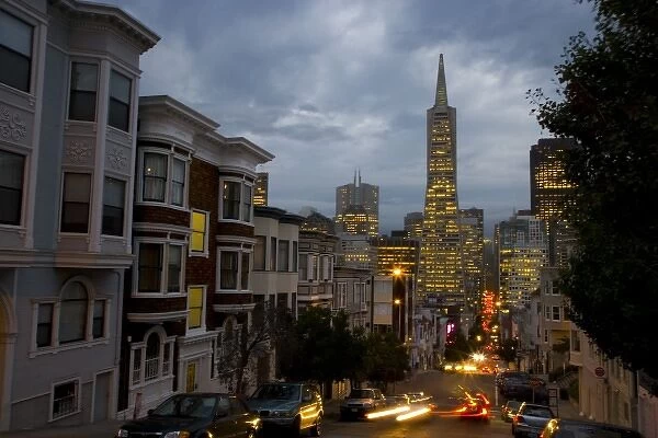 View of the TransAmerica Building from Montogomery Street just a dusk with the traffic