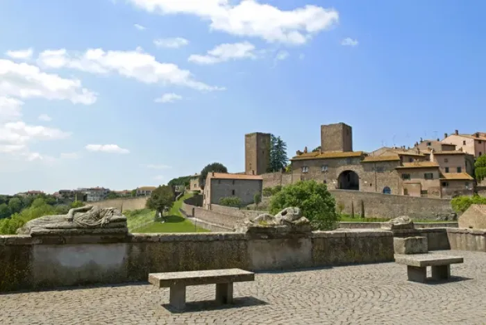 Framed Print : View of Tuscania from Bastianini Square and Etruscan sarcophagus, Viterbo province Framed Print : View of Tuscania from Bastianini Square and Etruscan sarcophagus, Viterbo province