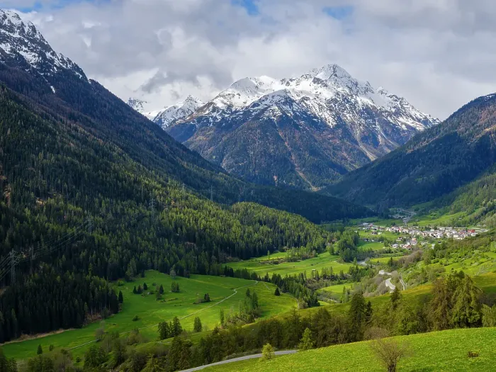 Framed Print : View towards village Lavin in the Lower Engadin in Grisons, Switzerland Framed Print : View towards village Lavin in the Lower Engadin in Grisons, Switzerland