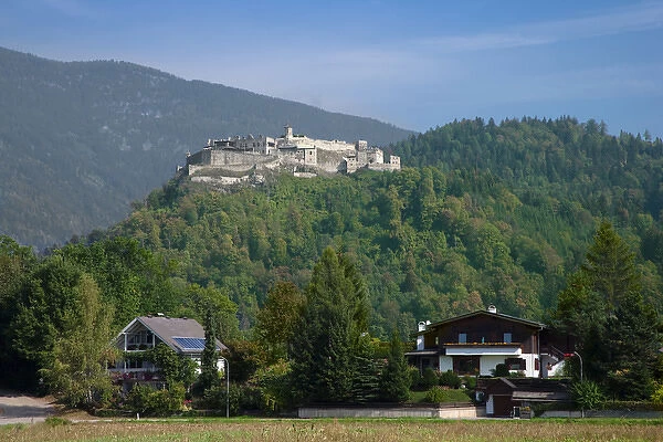Villach, Carinthia, Austria - Large homes nestled on and around a hillside. Horizontal