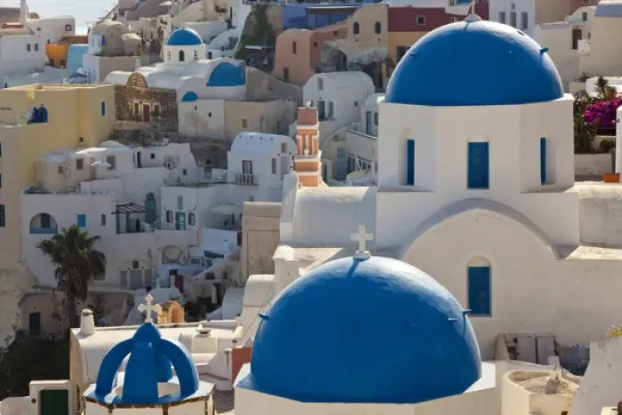 Framed Print : The village of Oia Santorini Cyclades islands, Greece