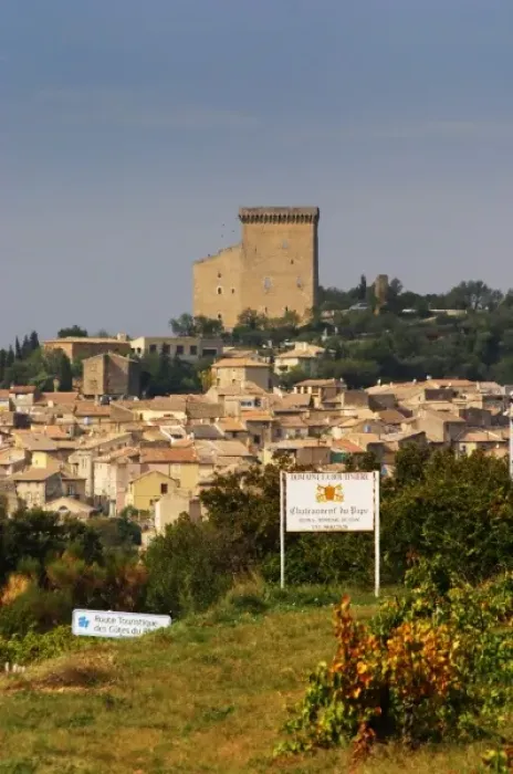 Framed Print : Village with the ruined chateau on top of the hill, the terracotta roof tops and houses