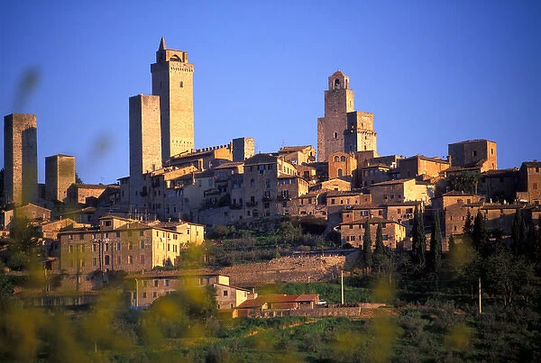 The village of San Gimignano sits in the rolling hills of Tuscany, Italy
