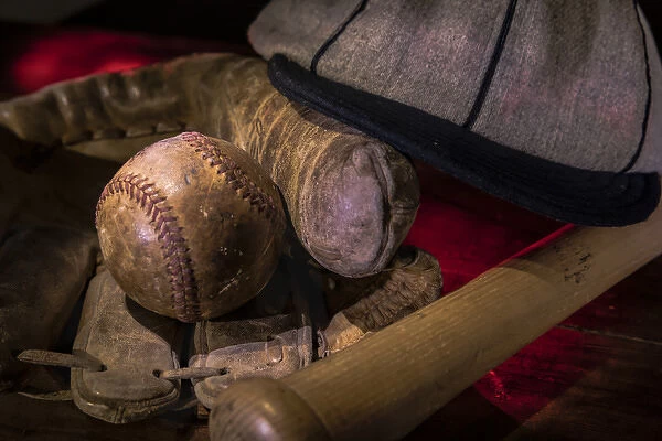 Vintage baseball paraphenalia laid out carefully painted with light