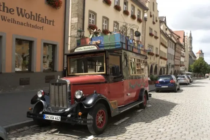 Framed Print : This vintage car is both a popular attraction for visitors and a promotional vehicle Framed Print : This vintage car is both a popular attraction for visitors and a promotional vehicle