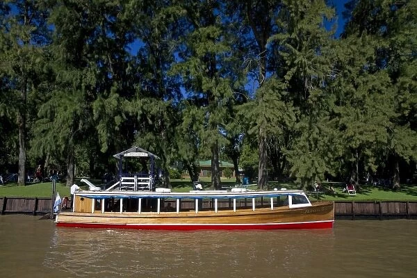 Vintage mahogany motorboat on the Parana Delta at Tigre, Argentina