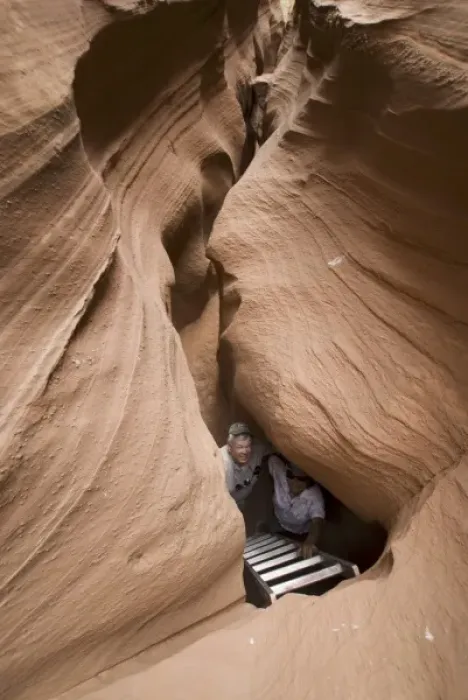 Framed Print : Visitors Making the Approach to Cathedral Canyon, Navajo Reservation, Arizona, US